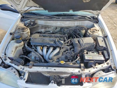 Zdjęcie 11 z 12 samochodu: 1999 TOYOTA COROLLA VE VIN:1NXBR12E7XZ195347 - miniatura