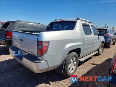 Trzecie zdjęcie samochodu z tyłu: 2006 HONDA RIDGELINE RTL VIN:2HJYK16536H537760 - miniatura