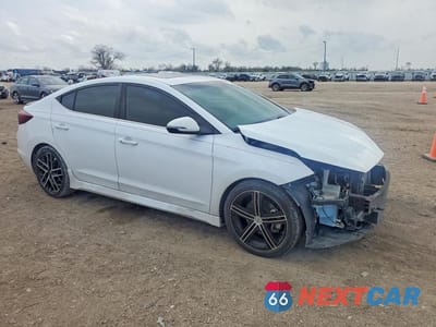 Czwarte zdjęcie samochodu z boku: 2020 HYUNDAI ELANTRA SPORT VIN:KMHD04LB4LU012621 - miniatura