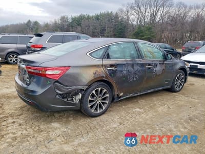 Trzecie zdjęcie samochodu z tyłu: 2016 TOYOTA AVALON HYBRID XLE PREMIUM VIN:4T1BD1EB7GU052740 - miniatura