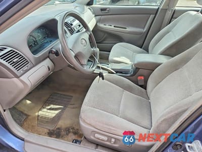 Zdjęcie 7 z 11 samochodu: 2004 TOYOTA CAMRY LE VIN:4T1BE32K64U789856 - miniatura