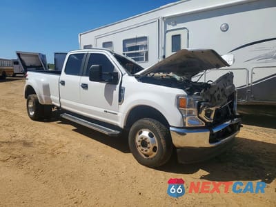Czwarte zdjęcie samochodu z boku: 2021 FORD F350 SUPER DUTY VIN:1FT8W3DT2MED76991 - miniatura