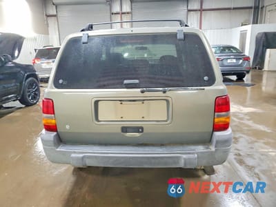 Zdjęcie 6 z 12 samochodu: 1998 JEEP GRAND CHEROKEE LAREDO VIN:1J4FX58S6WC207616 - miniatura