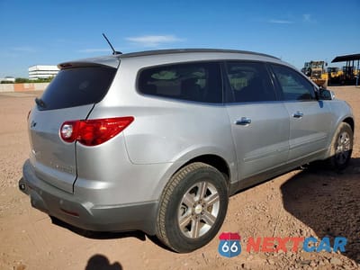 Trzecie zdjęcie samochodu z tyłu: 2010 CHEVROLET TRAVERSE LT VIN:1GNLVFED5AS132875 - miniatura