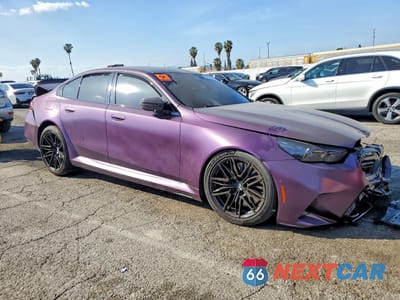 Czwarte zdjęcie samochodu z boku: 2025 BMW M5 VIN:WBS83FK00SCU35556 - miniatura