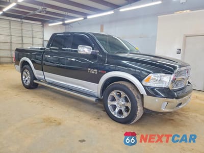 Czwarte zdjęcie samochodu z boku: 2016 RAM 1500 LARAMIE 3.0L V6 TDSL CREW CAB VIN:1C6RR7VM2GS226161 - miniatura