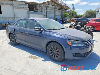 Czwarte zdjęcie samochodu z boku: 2015 VOLKSWAGEN PASSAT S VIN:1VWAT7A33FC041529 - miniatura