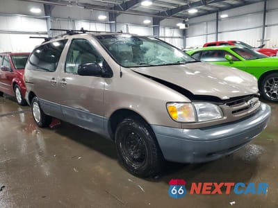 Czwarte zdjęcie samochodu z boku: 1999 TOYOTA SIENNA LE VIN:4T3ZF13C6XU093193 - miniatura