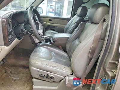 Zdjęcie 7 z 14 samochodu: 2002 GMC YUKON VIN:1GKEK13VX2R117374 - miniatura