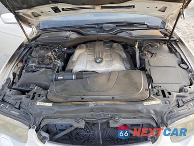 Zdjęcie 11 z 12 samochodu: 2003 BMW 745 LI VIN:WBAGN63463DR11803 - miniatura