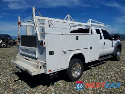 Trzecie zdjęcie samochodu z tyłu: 2016 FORD F450 SUPER DUTY UTILITY / SERVICE TRUCK VIN:1FD0X4GT6GEC74749 - miniatura