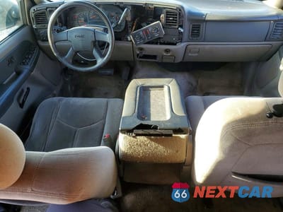 Zdjęcie 8 z 13 samochodu: 2003 GMC YUKON VIN:1GKEC13Z53R243305 - miniatura