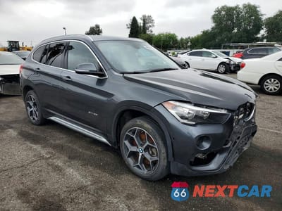 Czwarte zdjęcie samochodu z boku: 2018 BMW X1 SDRIVE28I VIN:WBXHU7C37J5L05119 - miniatura