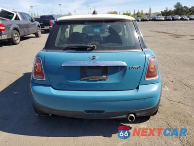 Zdjęcie 6 z 13 samochodu: 2009 MINI COOPER VIN:WMWMF33579TU70382 - miniatura