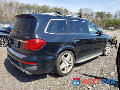 Trzecie zdjęcie samochodu z tyłu: 2015 MERCEDES-BENZ GL 550 4MATIC VIN:4JGDF7DE9FA499054 - miniatura