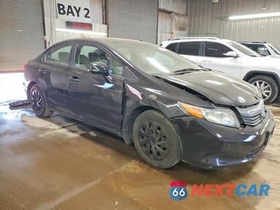 Czwarte zdjęcie samochodu z boku: 2012 HONDA CIVIC LX VIN:19XFB2F53CE014943 - miniatura
