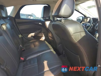 Zdjęcie 10 z 12 samochodu: 2014 FORD FOCUS TITANIUM VIN:1FADP3N27EL199827 - miniatura