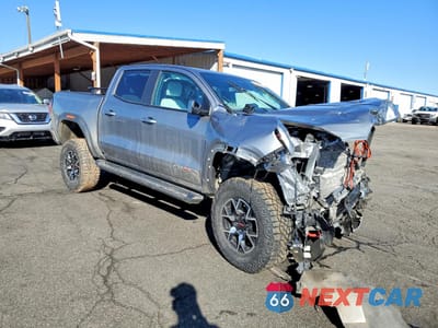 Czwarte zdjęcie samochodu z boku: 2024 GMC CANYON AT4X VIN:1GTP6EEK7R1114718 - miniatura