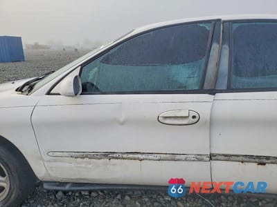 Zdjęcie 7 z 11 samochodu: 1997 FORD TAURUS GL VIN:1FALP52U0VA272156 - miniatura