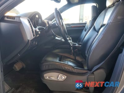 Zdjęcie 7 z 12 samochodu: 2011 PORSCHE CAYENNE S HYBRID VIN:WP1AE2A25BLA92501 - miniatura