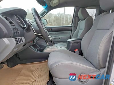 Zdjęcie 7 z 12 samochodu: 2012 TOYOTA TACOMA V6 VIN:5TFUU4EN6CX025210 - miniatura