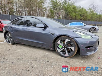 Czwarte zdjęcie samochodu z boku: 2022 TESLA MODEL 3 VIN:5YJ3E1EB1NF192388 - miniatura