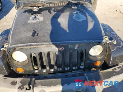 Zdjęcie 12 z 13 samochodu: 2007 JEEP WRANGLER SAHARA VIN:1J4GA59177L145799 - miniatura