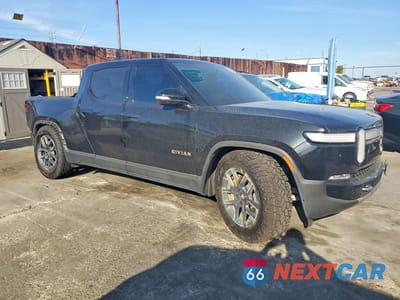 Czwarte zdjęcie samochodu z boku: 2022 RIVIAN R1T LAUNCH EDITION VIN:7FCTGAAL1NN009723 - miniatura