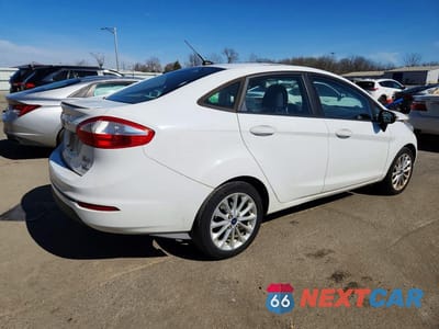 Trzecie zdjęcie samochodu z tyłu: 2014 FORD FIESTA SE VIN:3FADP4BJ2EM194650 - miniatura