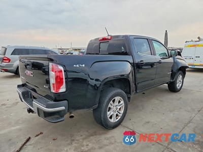 Trzecie zdjęcie samochodu z tyłu: 2019 GMC CANYON SLE VIN:1GTG6CEN3K1228834 - miniatura