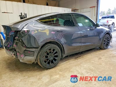 Trzecie zdjęcie samochodu z tyłu: 2022 TESLA MODEL Y VIN:7SAYGDEE6NF445283 - miniatura