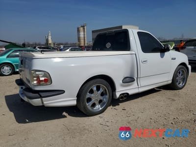 Trzecie zdjęcie samochodu z tyłu: 2002 FORD F150 SVT LIGHTNING VIN:2FTZF07332CA86454 - miniatura