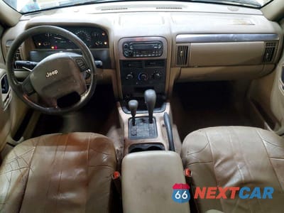 Zdjęcie 8 z 13 samochodu: 2004 JEEP GRAND CHEROKEE LAREDO VIN:1J4GW48S44C378346 - miniatura
