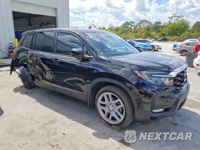 Czwarte zdjęcie samochodu z boku: 2024 HONDA PASSPORT EXL VIN:5FNYF8H59RB004725 - miniatura