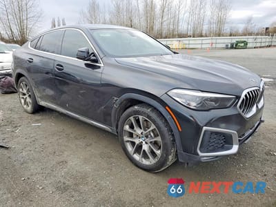 Czwarte zdjęcie samochodu z boku: 2021 BMW X6 XDRIVE40I VIN:5UXCY6C02M9D95614 - miniatura