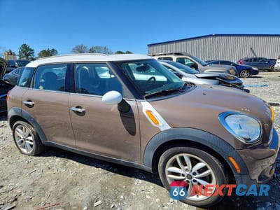 Czwarte zdjęcie samochodu z boku: 2011 MINI COOPER COUNTRYMAN VIN:WMWZB3C53BWM00769 - miniatura