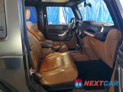 Zdjęcie 10 z 11 samochodu: 2011 JEEP WRANGLER SAHARA VIN:1J4AA5D12BL538454 - miniatura