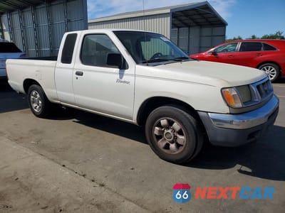 Czwarte zdjęcie samochodu z boku: 2000 NISSAN FRONTIER XE VIN:1N6DD26S4YC348546 - miniatura