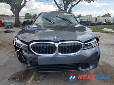 Piąte zdjęcie samochodu w środku: 2021 BMW 330I VIN:3MW5R1J07M8C06182 - miniatura