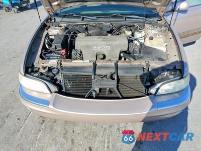 Zdjęcie 11 z 12 samochodu: 1998 BUICK PARK AVENUE VIN:1G4CW52K6W4651444 - miniatura