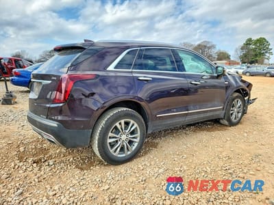 Trzecie zdjęcie samochodu z tyłu: 2021 CADILLAC XT5 PREMIUM LUXURY VIN:1GYKNCRS8MZ193266 - miniatura