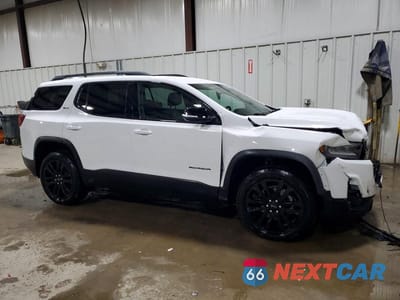 Czwarte zdjęcie samochodu z boku: 2023 GMC ACADIA SLT VIN:1GKKNULS4PZ158754 - miniatura