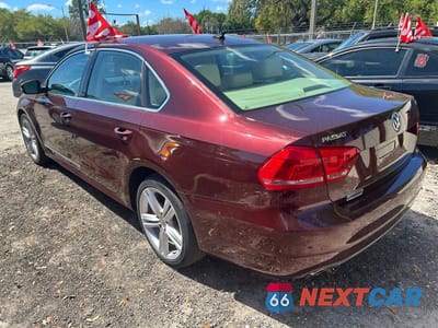 Trzecie zdjęcie samochodu z tyłu: 2014 VOLKSWAGEN PASSAT SE VIN:1VWBN7A39EC002991 - miniatura