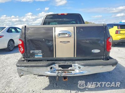 Zdjęcie 6 z 12 samochodu: 2001 FORD F150 VIN:2FTRX07L81CA15889 - miniatura