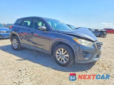 Czwarte zdjęcie samochodu z boku: 2016 MAZDA CX-5 SPORT VIN:JM3KE2BY9G0631761 - miniatura