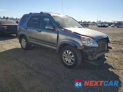 Czwarte zdjęcie samochodu z boku: 2006 HONDA CR-V EX VIN:JHLRD78876C052590 - miniatura