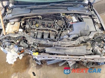 Zdjęcie 11 z 11 samochodu: 2013 FORD FOCUS TITANIUM VIN:1FADP3N23DL277115 - miniatura