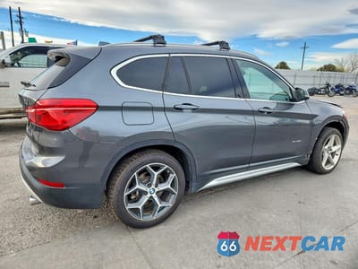 Trzecie zdjęcie samochodu z tyłu: 2017 BMW X1 XDRIVE28I VIN:WBXHT3C38H5F69085 - miniatura