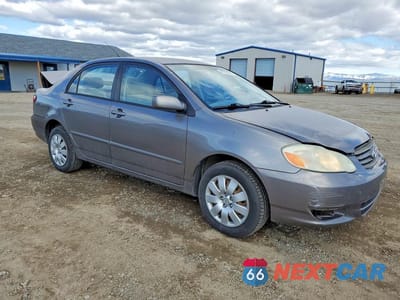 Czwarte zdjęcie samochodu z boku: 2003 TOYOTA COROLLA LE VIN:1NXBR32E33Z055186 - miniatura