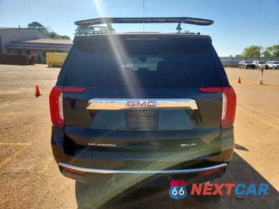 Zdjęcie 6 z 12 samochodu: 2021 GMC YUKON SLT VIN:1GKS1BKD7MR120739 - miniatura